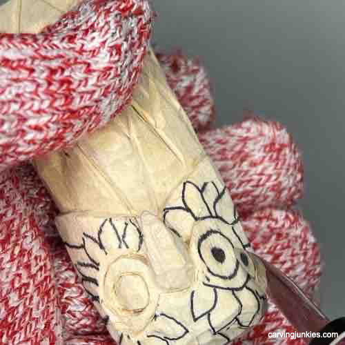 Follow our instructions to craft a detailed wooden owl. Shaping eyes on wooden owl