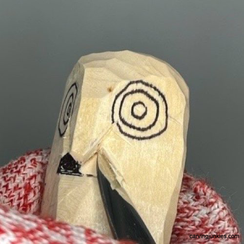 Experience the magic of creating a wooden owl sculpture. Making a pyramid cut on owl carving