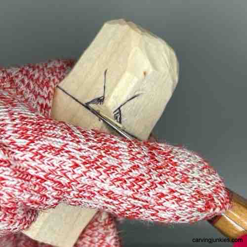 Follow our guide to craft a stunning wooden owl. Making a stop cut on own carving