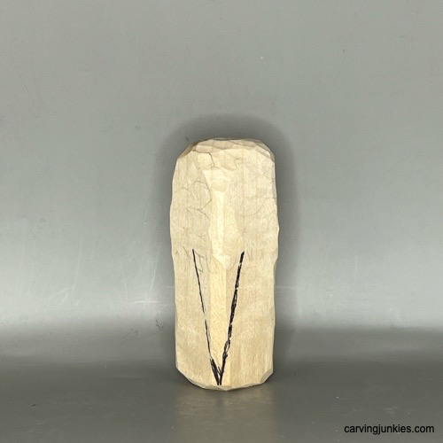 Bring out the beauty of wood with our owl project guide. Tail feather is sketched on own carving
