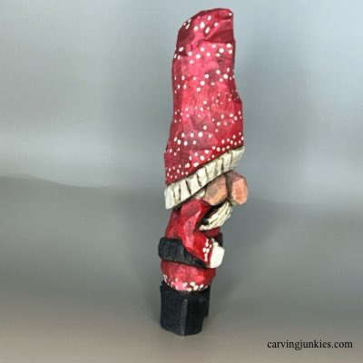 Right view of painted wood carved Christmas gnome