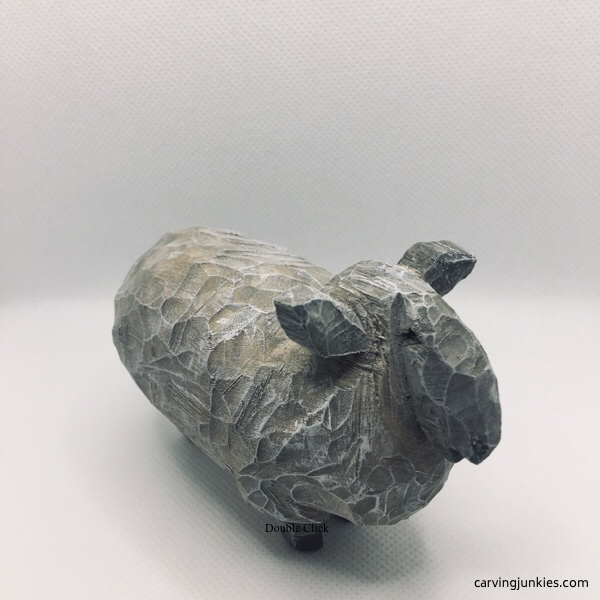 Right view of painted wood carving