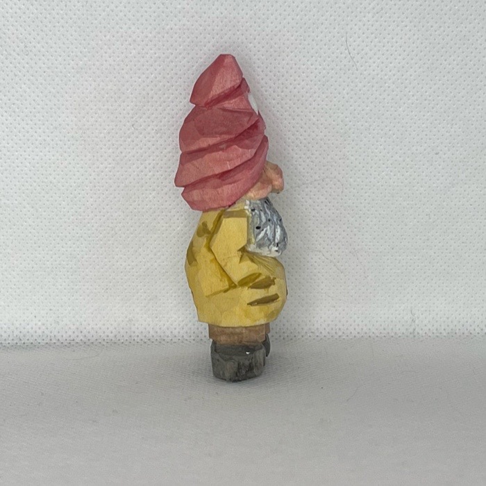 Right side  of painted wood carved gnome
