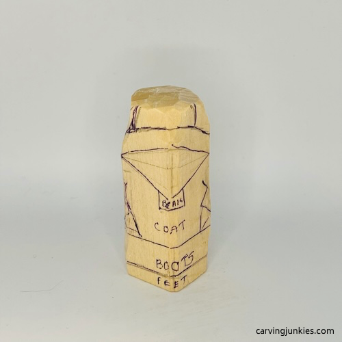 Front details drawn for carving a penguin