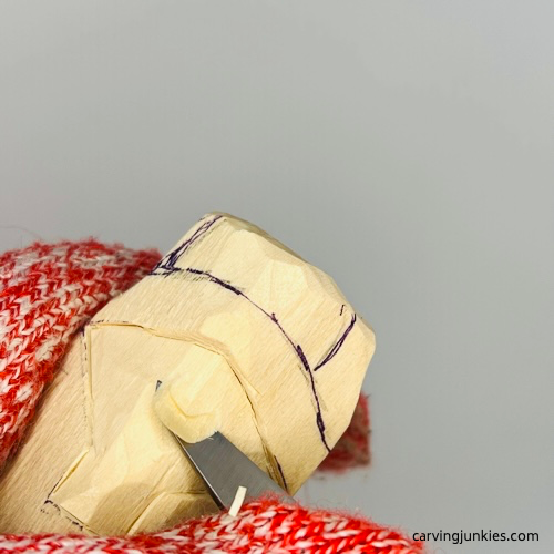 Flattening face for carving a penguin