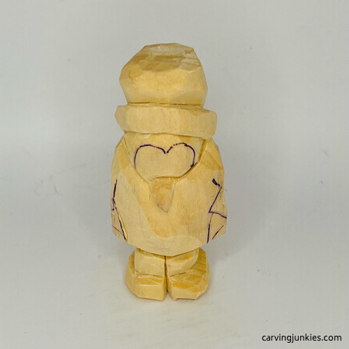 Progress photo for carving a penguin