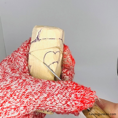 Shaping beak for carving a penguin