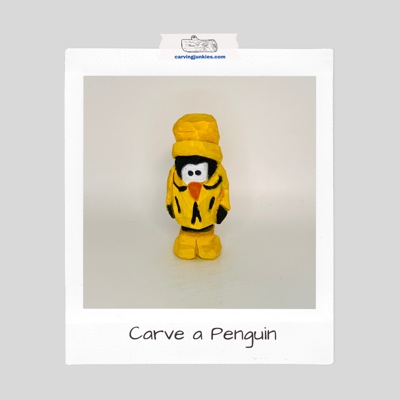 Penguin wood carving
