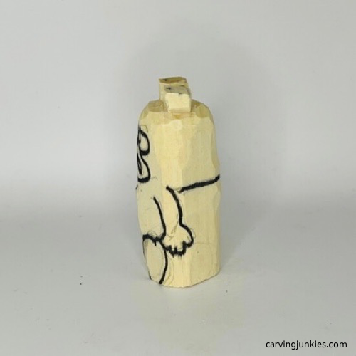 Left view of details for carving wood pig