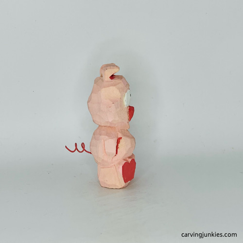 RIght view of painted wood pig