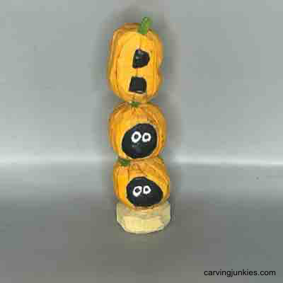 Front of wood carved pumpkins painted