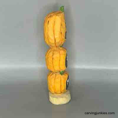 Right view  of wood carved pumpkins painted