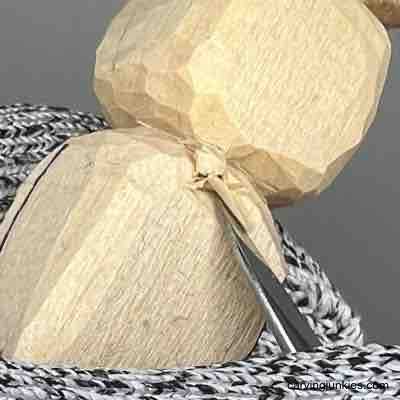 Shaping stem on pumpkin wood carving