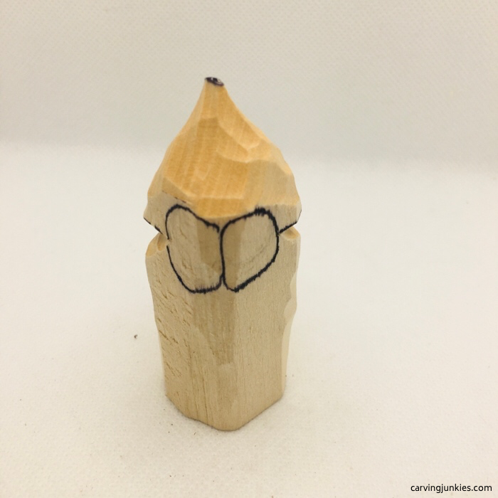 Eyes drawn on basswood