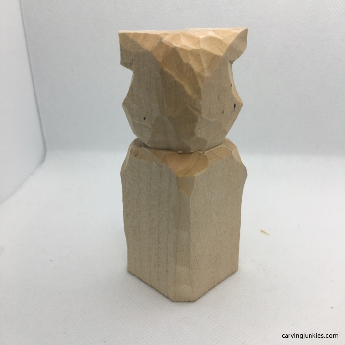 Back of raccoon carving