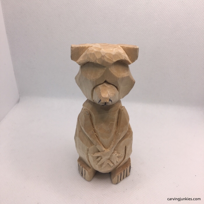 Adding feet to raccoon carving