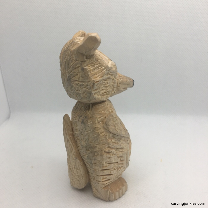 Right view of raccoon carving with fur cuts