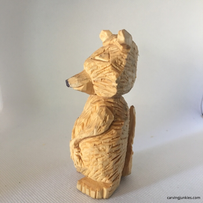 Left view of cleaned raccoon carving