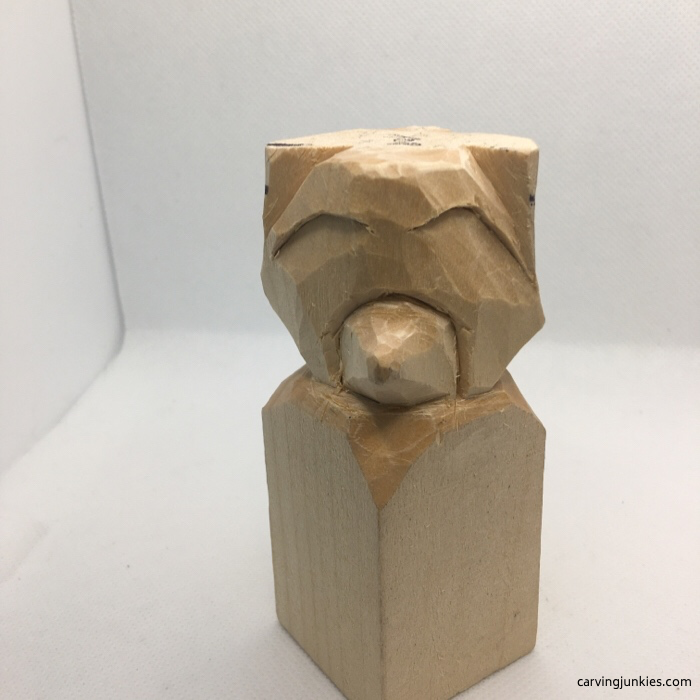 Front of raccoon carving in progress