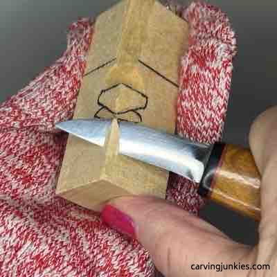 Flattening wood carved green man