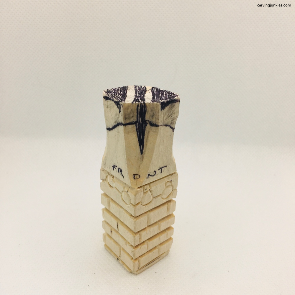 Splitting Santa legs on wood carving