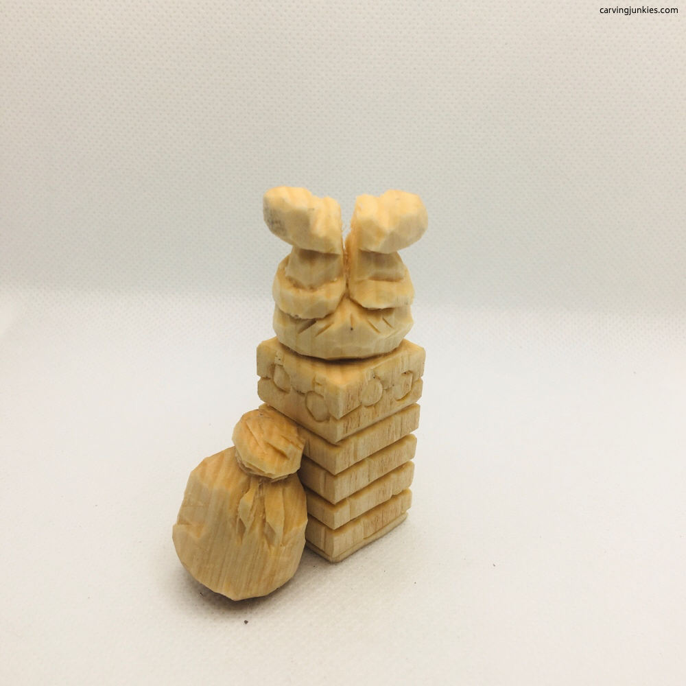 Santa with gift bag near chimney