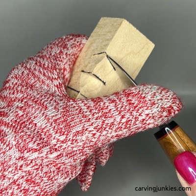 Carving eyeline on green man