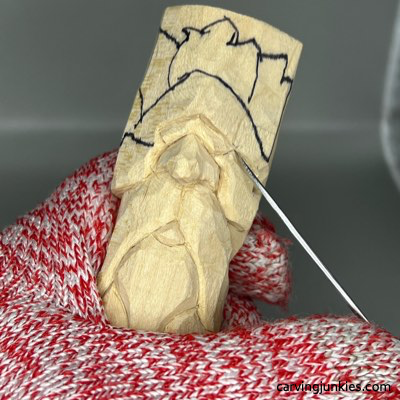 Separating sides on wood carved green man