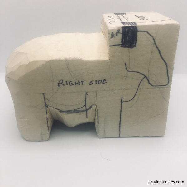 Wood sheep carving in progress