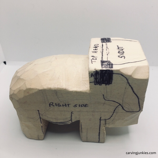 Carving snout on wooden sheep