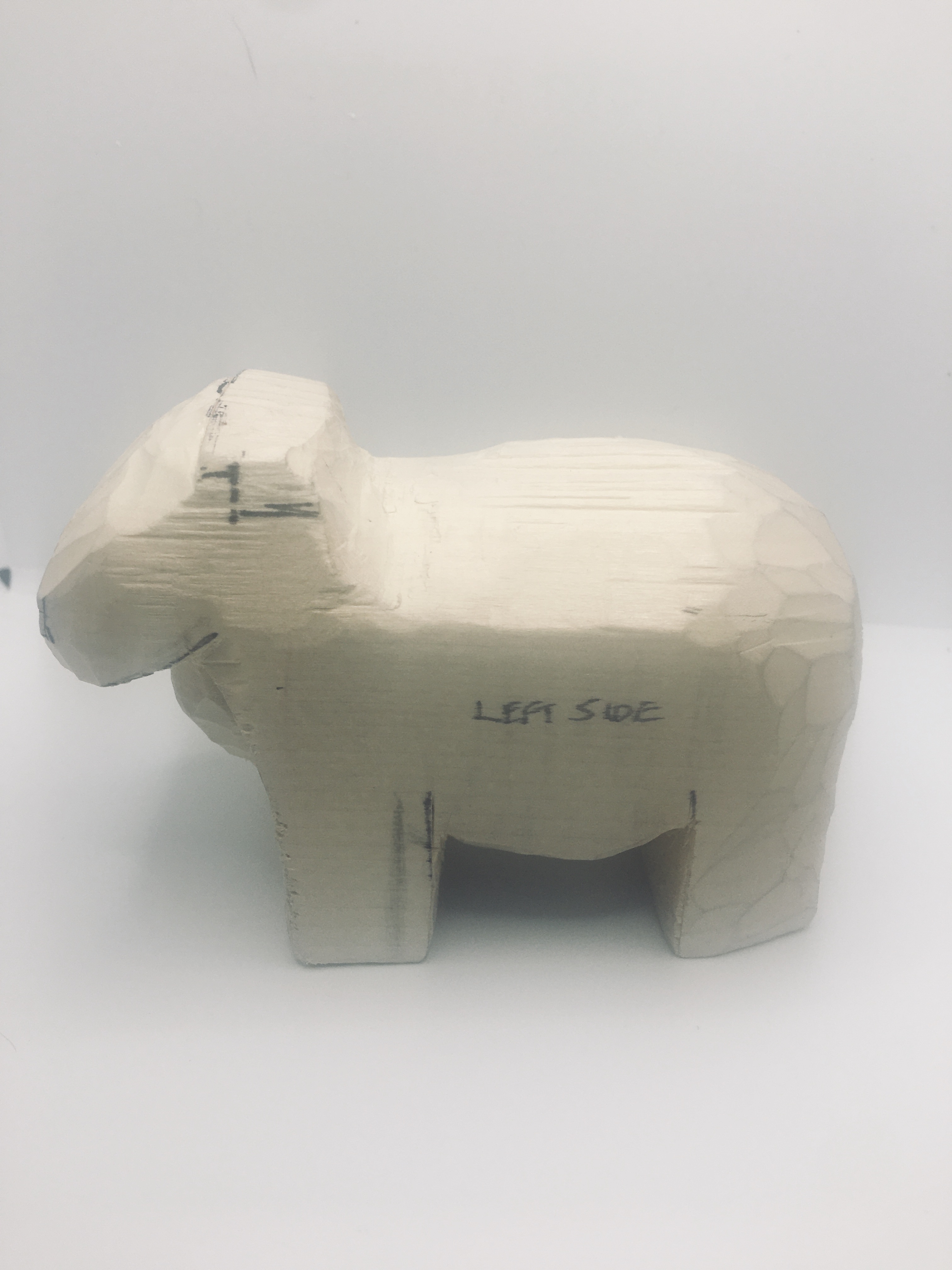 Left view of wood sheep belly