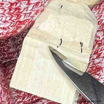 Create an adorable wooden character with our detailed tutorial. Narrowing pants on small guy wood carving