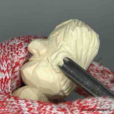 Bring wood to life with a tiny character carving project. Carving inner ear on small guy wood carving