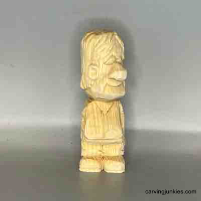 Start your wood carving adventure with a little figure tutorial. Front view of unpainted small guy wood carving