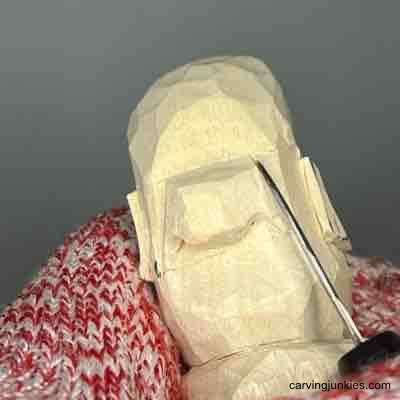 Carve an fun big nose on this little guy wood carving Carving sides of nose on small guy