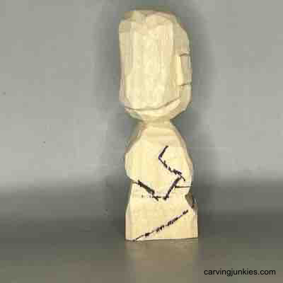 Learn to carve a delightful small wood person. Right view of details on small guy wood carving
