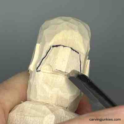 Experience the joy of making a little wood caricature.. Carving nostril on small guy wood carving
