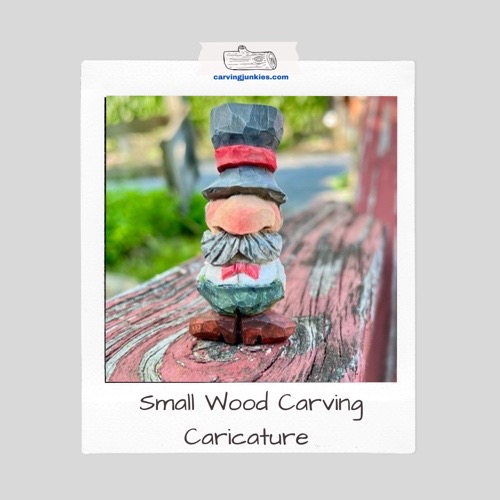 Small wooden caricature with huge nose