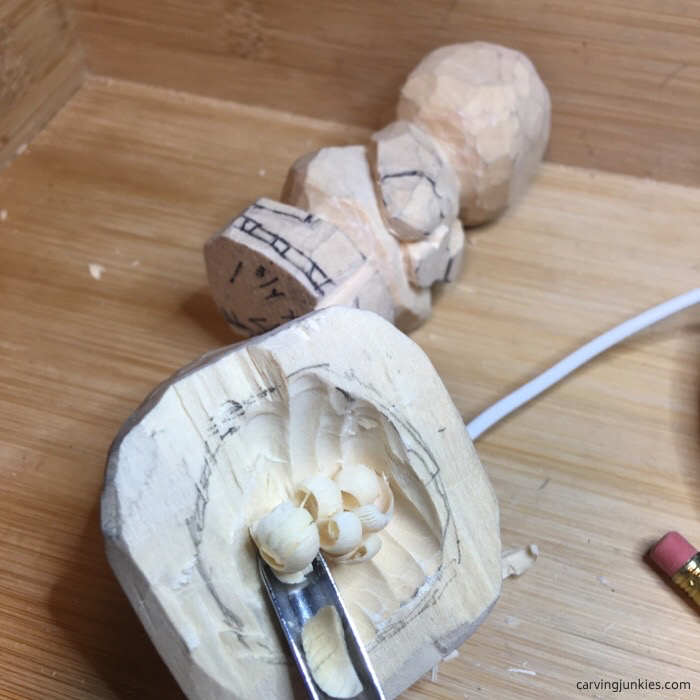 Carving wooden snowman hat