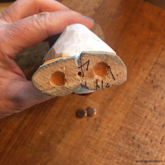 Adding magnets to snowman wood carving