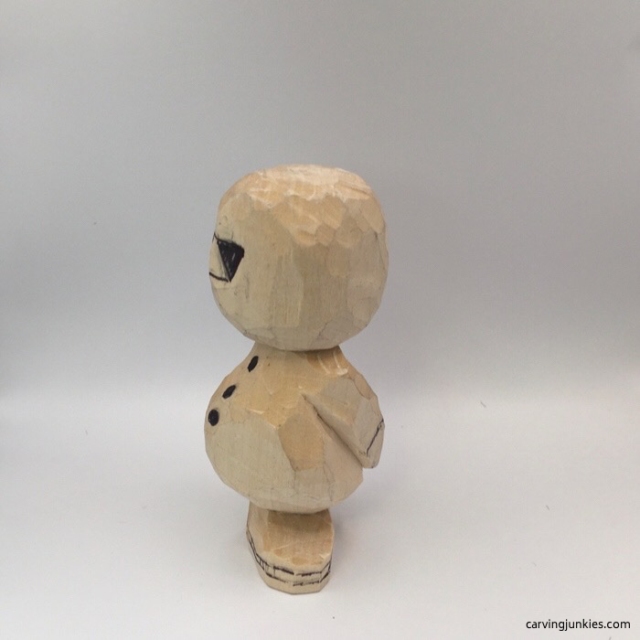 Left arm of wooden snowman