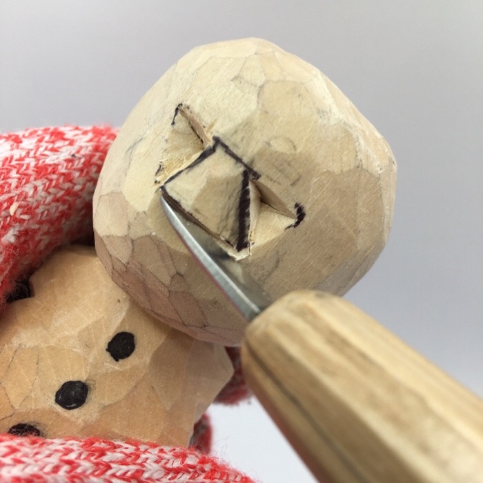 Carving snowman nose