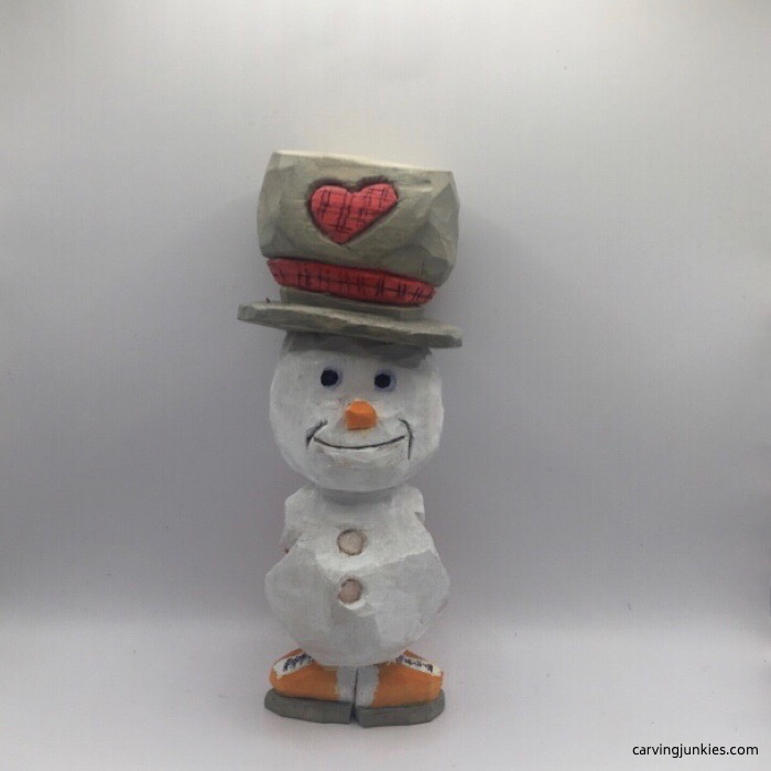 Painted wooden snowman carving