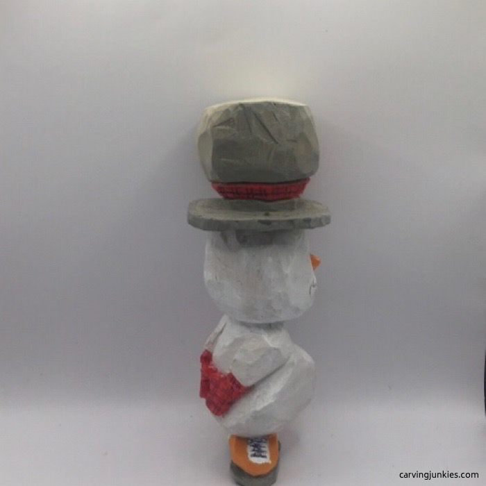 Painted right side of wood snowman