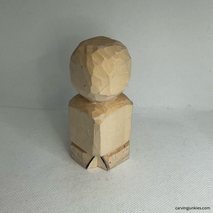 Wood snowman head is rounded