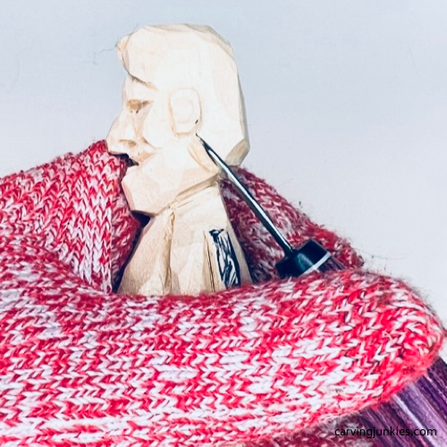 Carving hairline on tiny wood carving man