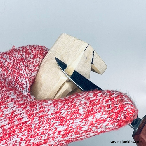 Shaping the hips on your tiny wood carving man