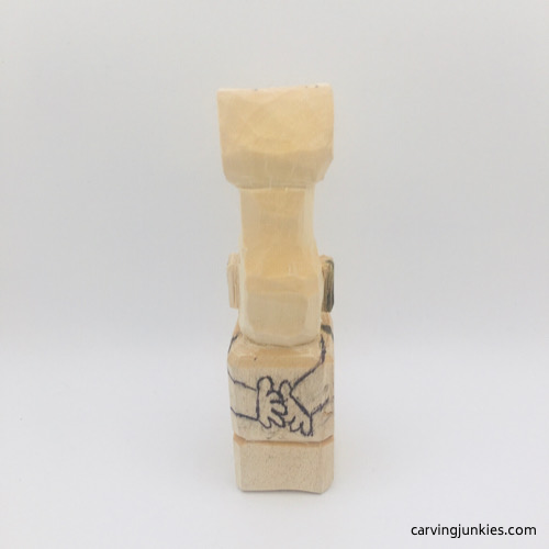 Back view of troll wood carving Back progress of troll wood carving