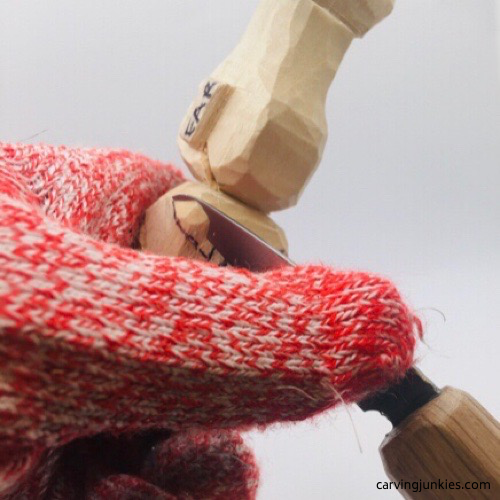 Carving back shoulders on troll wood carving Cutting back shoulders on troll wood carving