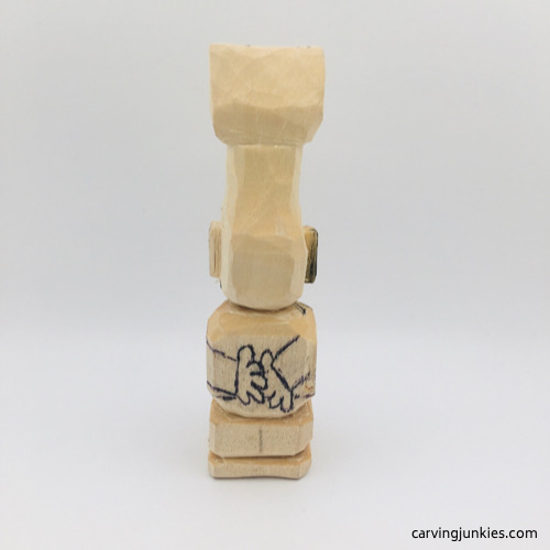 Back side of hands on troll wood carving Back view of hands on troll wood carving